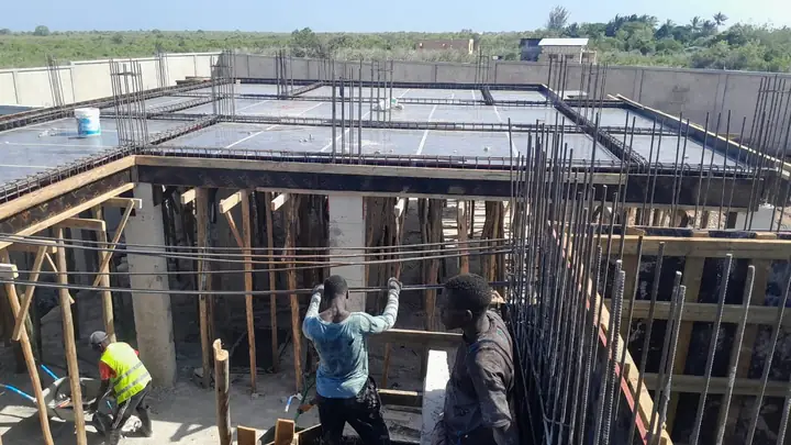 SICOM team fixing steel reinforcement and formwork in Nungwi
